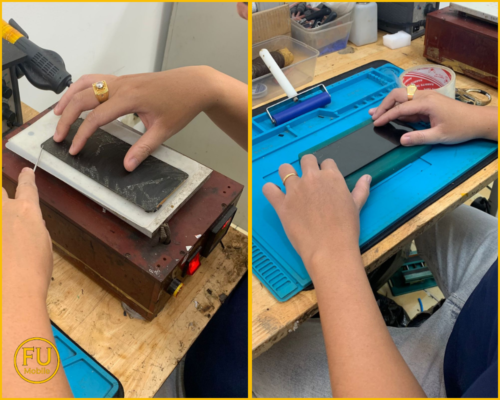 Nhân viên đang vệ sinh máy và trao trả điện thoại sạch đẹp cho khách hàng